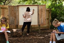 Students attend class in an outdoor classroom at Bentley Primary School