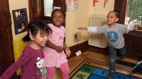 Pre-k students dancing in classroom