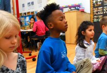 Students meditate at school