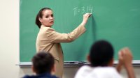 A teacher gives her class a “don’t mess with me” look.