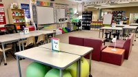 The author's flexible classroom, with many different seating arrangements such as chairs, couches, yoga balls, and stools