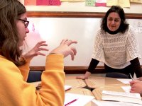 image of a teacher talking to a student