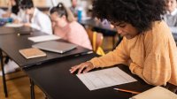 High school student taking a test in class