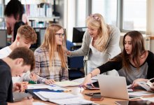 Teacher working with student study group