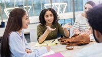 Middle school students involved in a classroom discussion