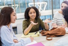 Middle school students involved in a classroom discussion