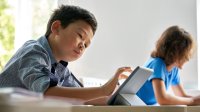 Elementary student using a tablet