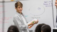 Student giving a presentation in science class