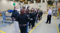 Students touring a factory