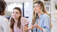 Mother and daughter in a meeting