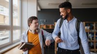 Teacher and student giving each other an elbow bump