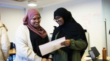 Teacher Fatima Belouahi and student in class