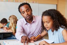 photo of elementary school teacher and student