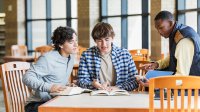 High school students work on group project