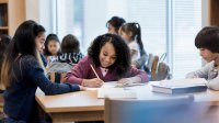 Middle school students working in classroom