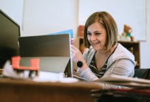 Elementary school teacher conducting a reading lesson through distance learning