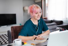 Teenage girl distance learning on laptop at home