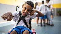 Portrait of student with disability in physical education class