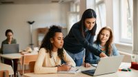 Photo of high school teacher and students