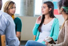 A group of students talking in a restorative circle