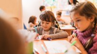 Photo of elementary students drawing