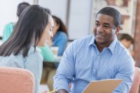 Guest speaker works with high school student