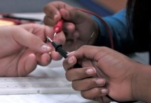 Hands at work on an electrical project