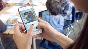 A teacher is texting a message for parents to see on ClassDojo.