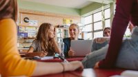 High school students work together in classroom