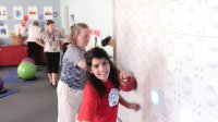 photo of a student using a light wall