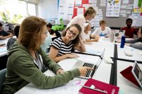 Group of students learning in a classroom