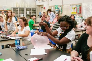 Pre-service teachers in the UTeach Austin program work on a STEM activity.