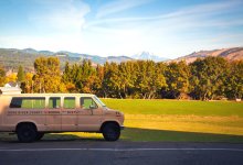 Hood River County School District van with the mountains and trees in the background